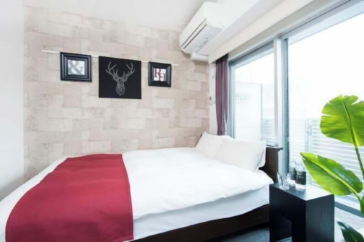 Down comforters, desk, blackout drapes, soundproofing