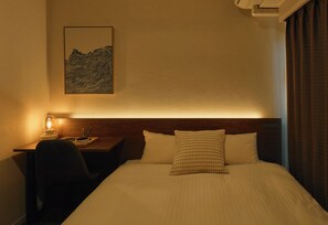 Down comforters, desk, blackout drapes, soundproofing