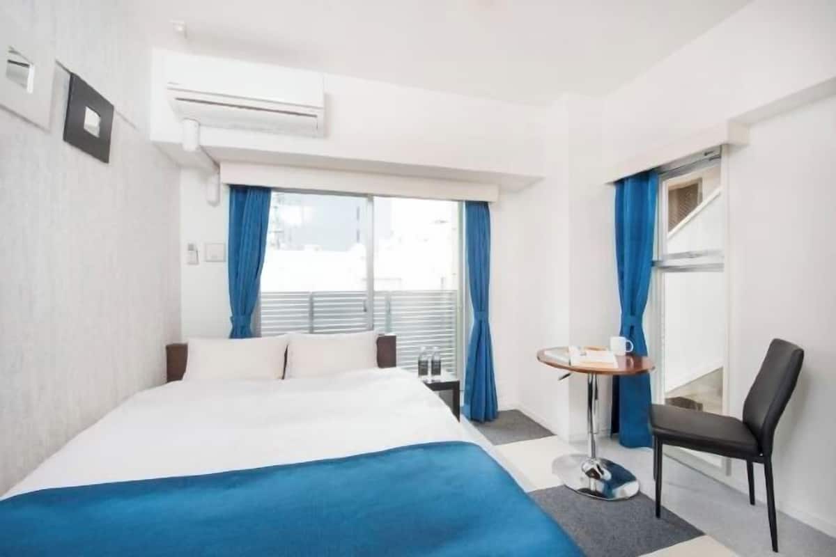 Down comforters, desk, blackout drapes, soundproofing