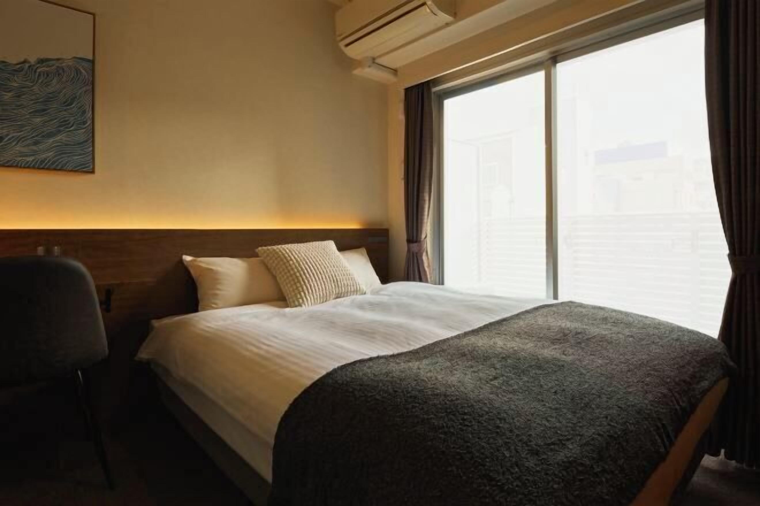 Down comforters, desk, blackout drapes, soundproofing