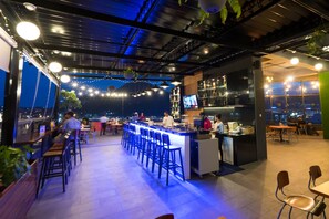 Breakfast, lunch, dinner served; local and international cuisine