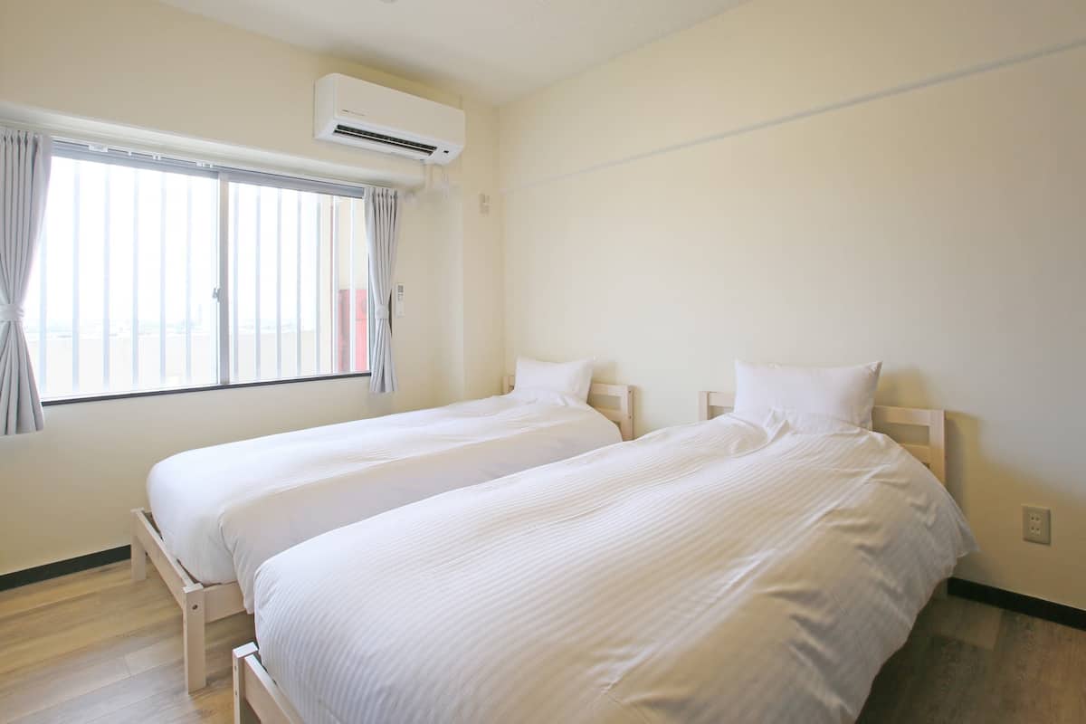 Standard, Non Smoking (Twin room and Japanese Style room) | 2 bedrooms, in-room safe, individually decorated, iron/ironing board