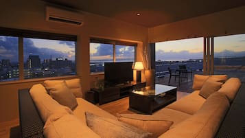 Sky Penthouse, Non Smoking | Living area | Flat-screen TV