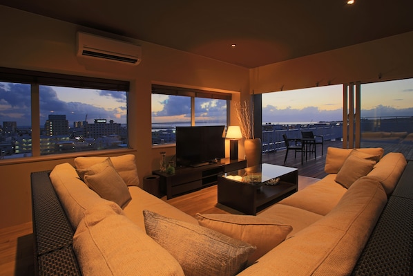 Sky Penthouse, Non Smoking | Living area | Flat-screen TV
