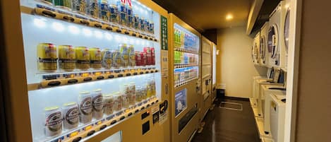 Vending machines with various beverages and snacks.