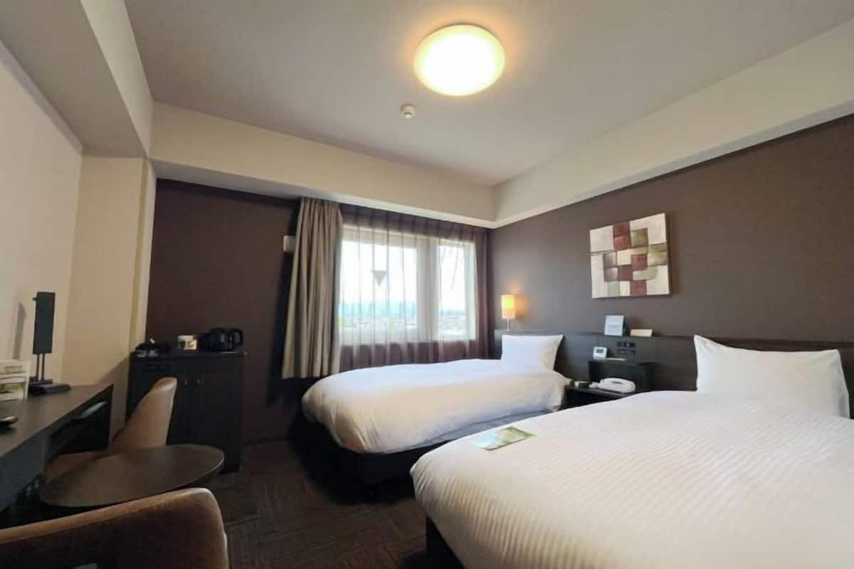 Desk, free WiFi, bed sheets