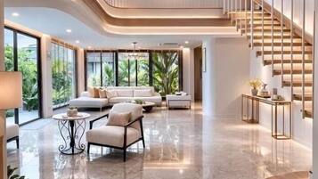 4-Bedroom Beachfront Pool Villa | Brankas, dilengkapi dengan perabotan berbeda-beda, dan meja kerja