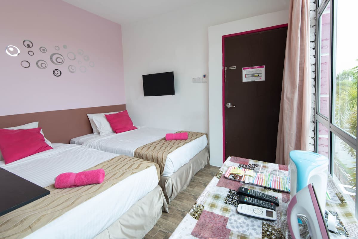 family room | premium bedding, desk, iron/ironing board, free wifi