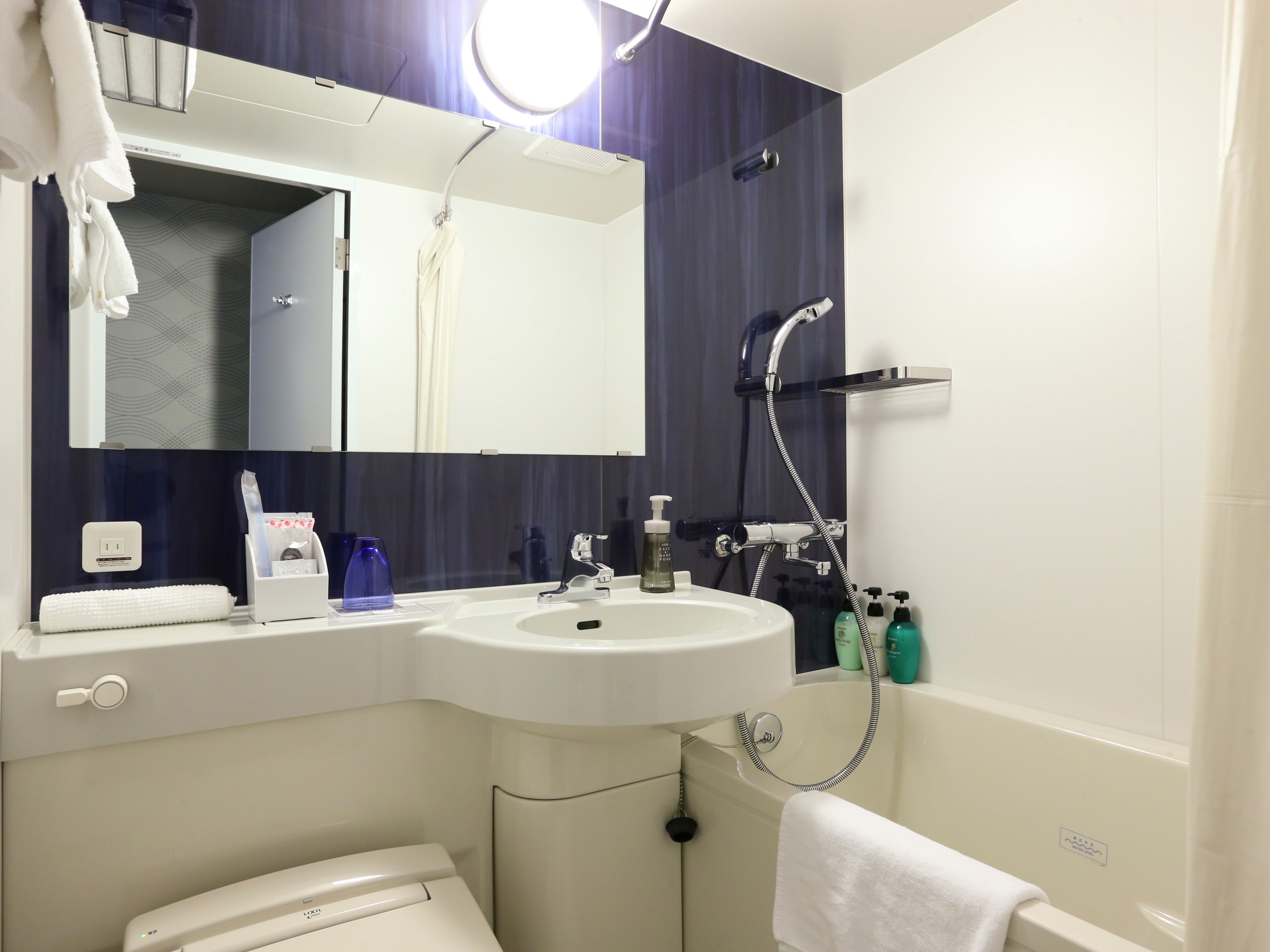 combined shower/bathtub, free toiletries, hair dryer, bathrobes