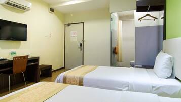 Deluxe Twin Room | In-room safe, desk, laptop workspace, iron/ironing board