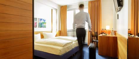 Standard Double or Twin Room | In-room safe, desk, laptop workspace, blackout curtains