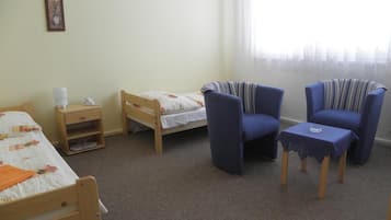 Desk, blackout curtains, free WiFi, bed sheets