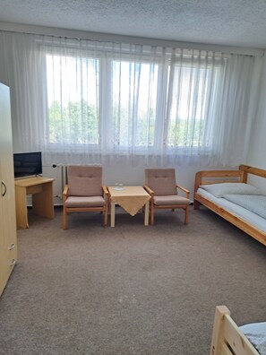 Desk, blackout curtains, free WiFi, bed sheets