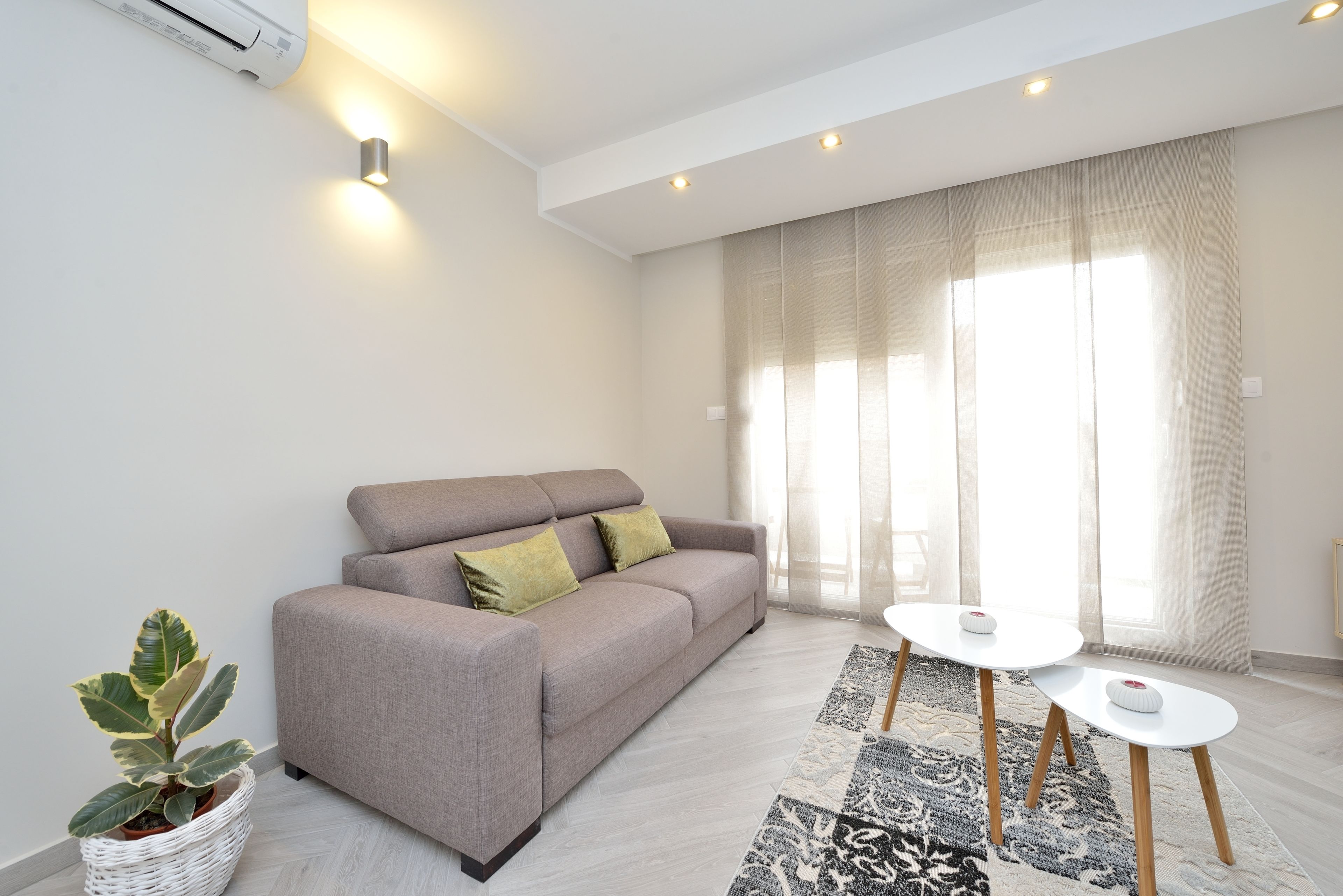 Superior Apartment, Balcony, Garden View | Living area | Flat-screen TV