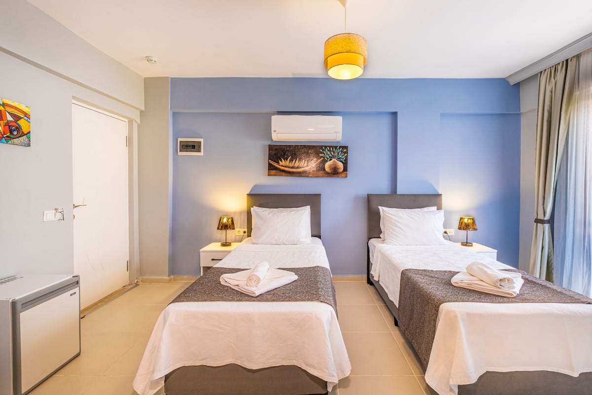 Standaard Twin kamer | Een minibar, gratis wifi, beddengoed