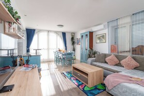 Apartment, 2 Bedrooms, Terrace, Sea View | Living area | 25-inch flat-screen TV with satellite channels, TV - Apartments and Room Lora (Dubrovnik)