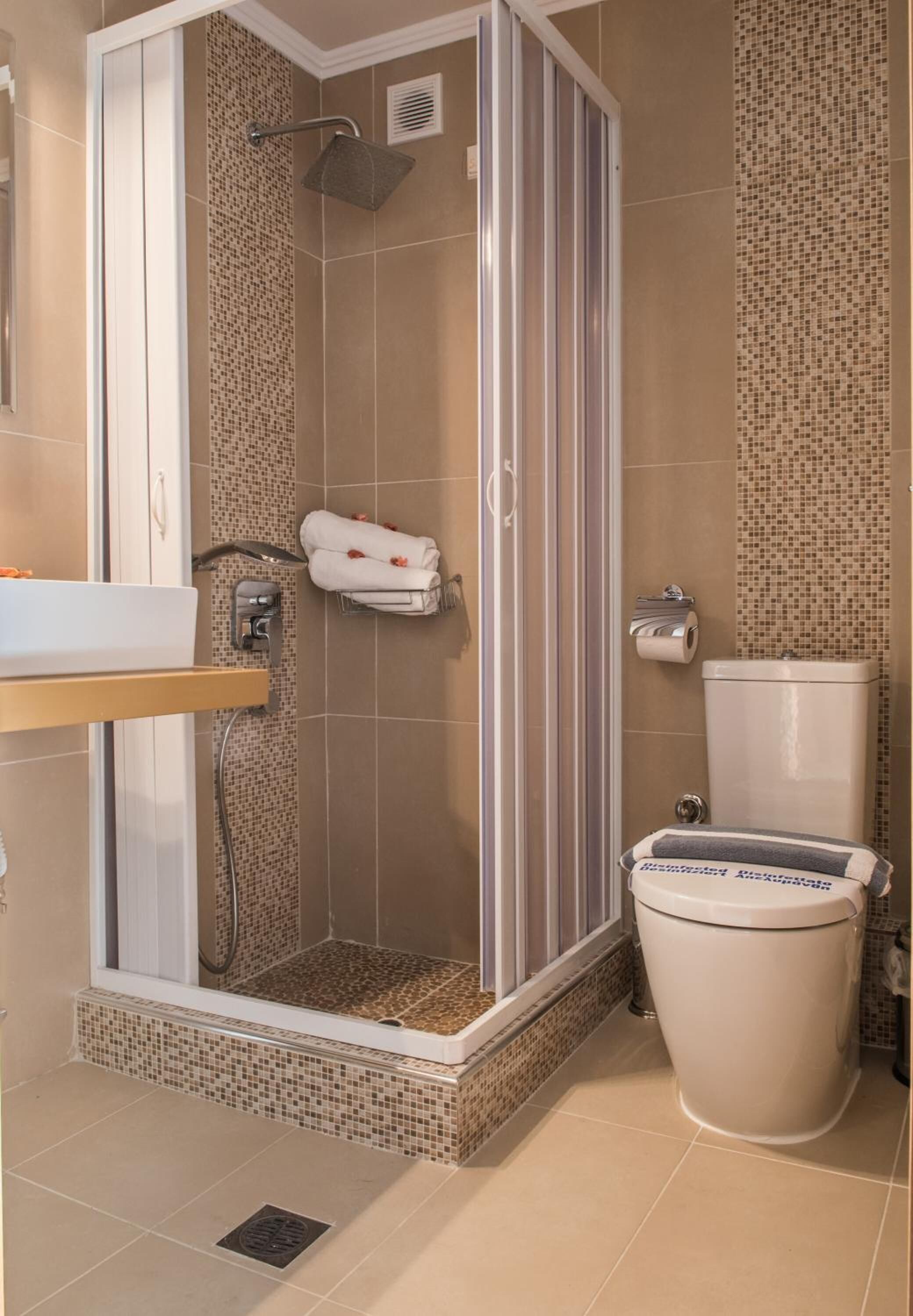 shower, free toiletries, hair dryer, slippers