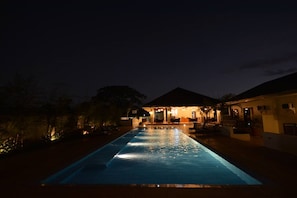 Outdoor pool, open 7:00 AM to 10:00 PM, sun loungers