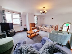 Standard Villa, 2 Bedrooms (dog friendly) | Living area | Flat-screen TV, DVD player - Tregurrian Villas (Newquay)