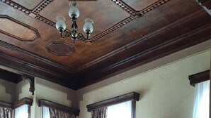 A traditional room with a bed, a desk, a television, and a wardrobe. - Mihran Hanım Konagi (Edirne)