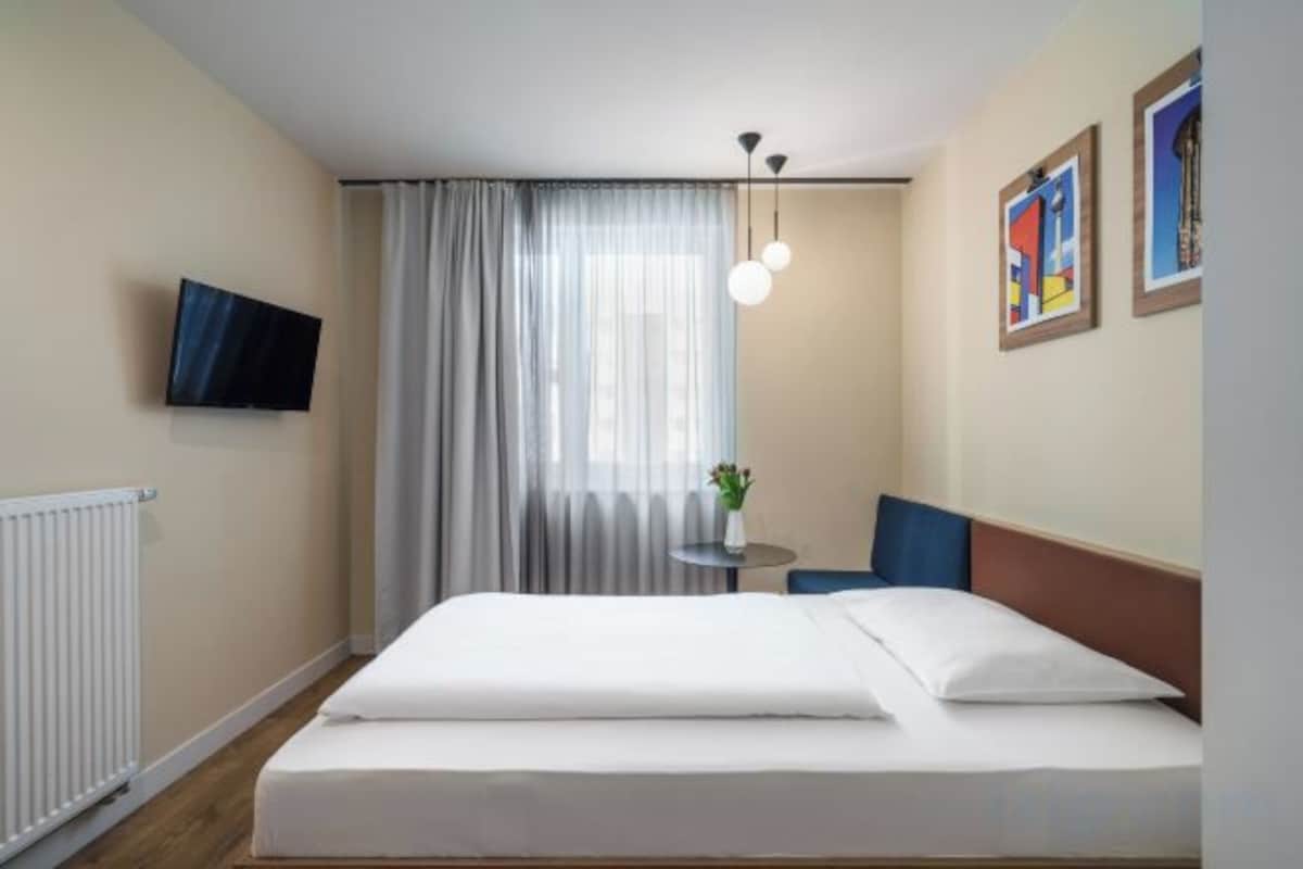 Chambres insonorisées, fer et planche à repasser, Wi-Fi gratuit