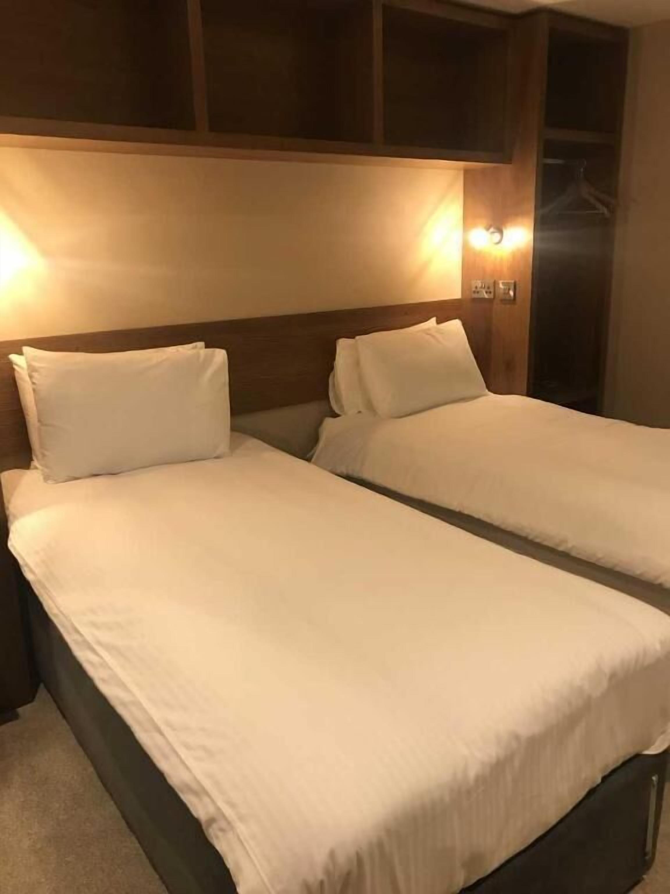 economy double or twin room - motel building | 1 bedroom, free wifi, bed sheets