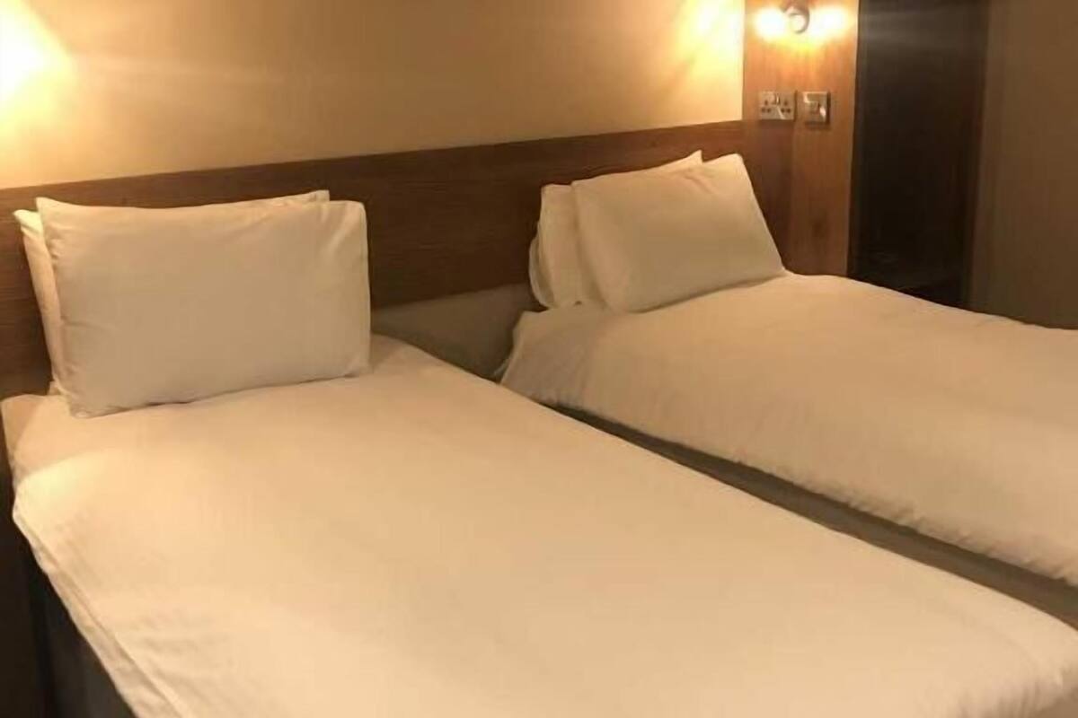 economy double or twin room - motel building | 1 bedroom, free wifi, bed sheets