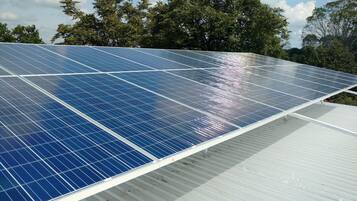 A large solar panel array on a rooftop.