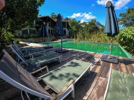 Outdoor pool, pool umbrellas, sun loungers