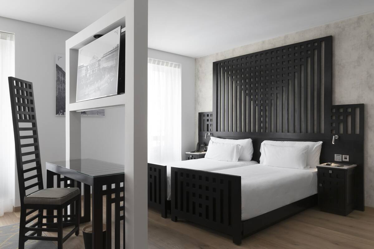 尊荣双人房, 城市景观 | 高档床上用品、羽绒被、记忆海绵床垫、迷你吧