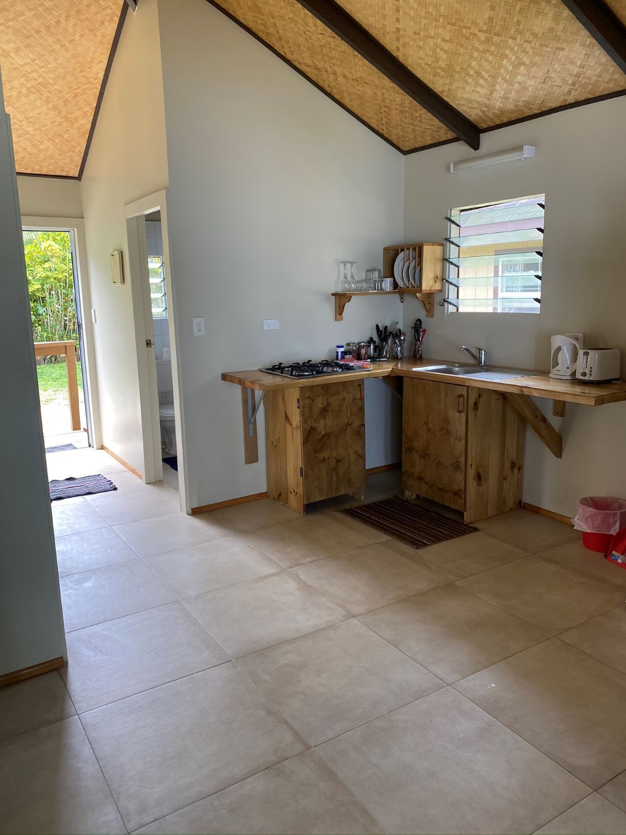 Bungalow 3, 1 Bedroom, Beachfront | Private kitchen | Full-size fridge, electric kettle, toaster, cookware/dishes/utensils