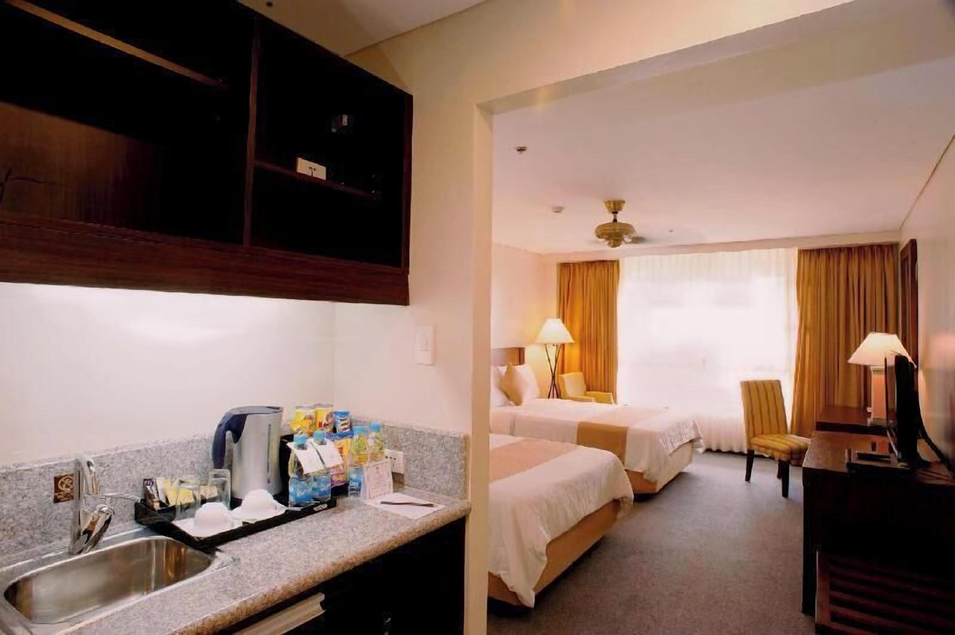 Minibar, desk, blackout curtains, iron/ironing board