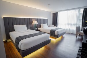Superior Room | Minibar, desk, blackout curtains, iron/ironing board