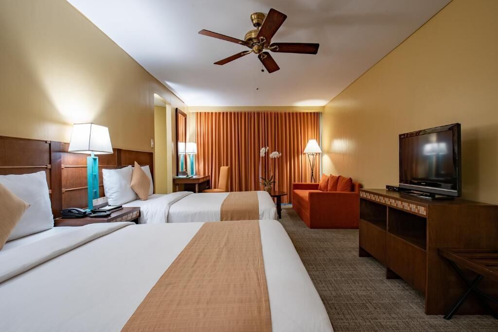 Minibar, desk, blackout curtains, iron/ironing board