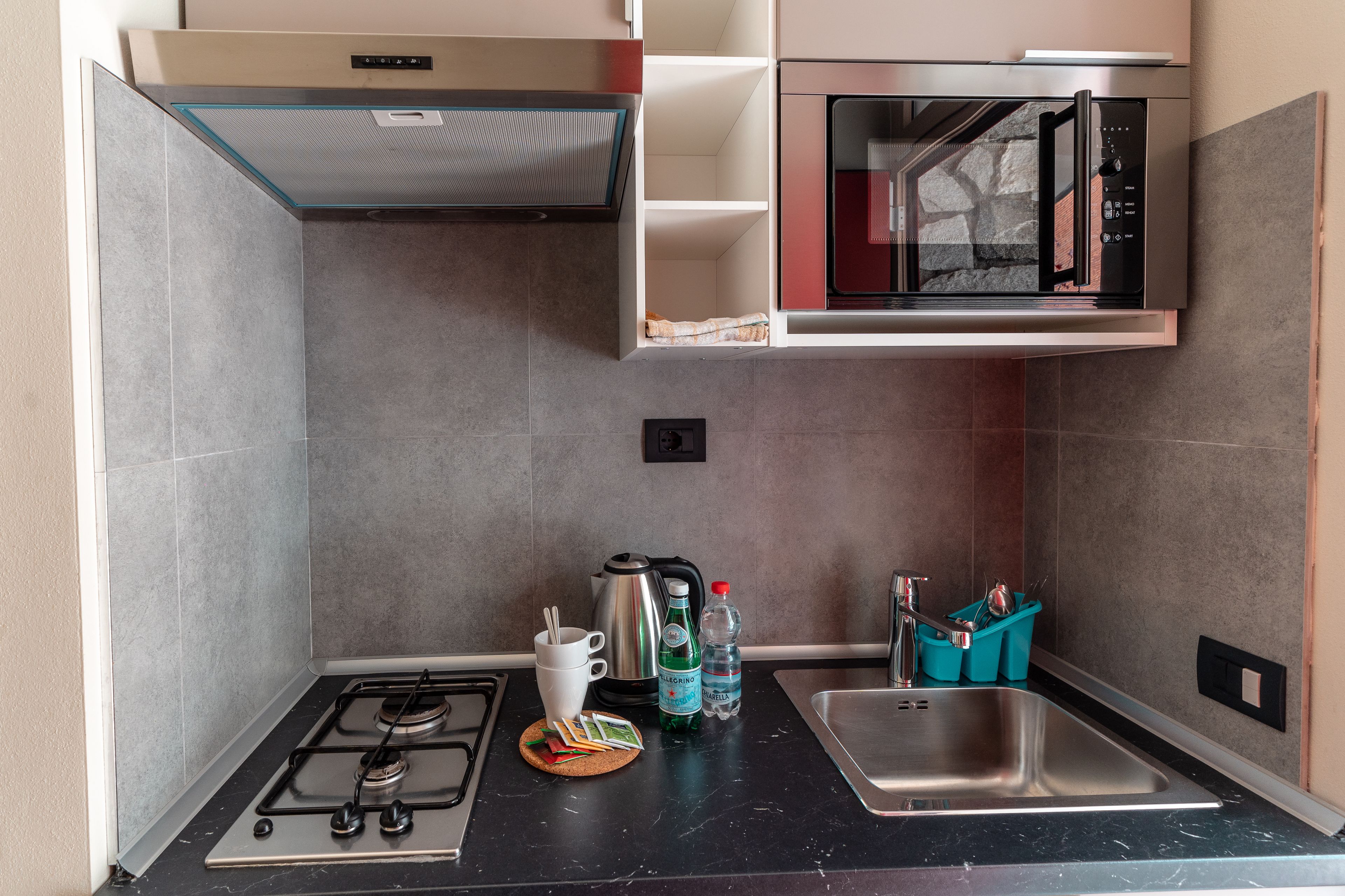 bungalow, 1 bedroom, patio, ground floor | private kitchen | fridge, coffee/tea maker, electric kettle, high chair