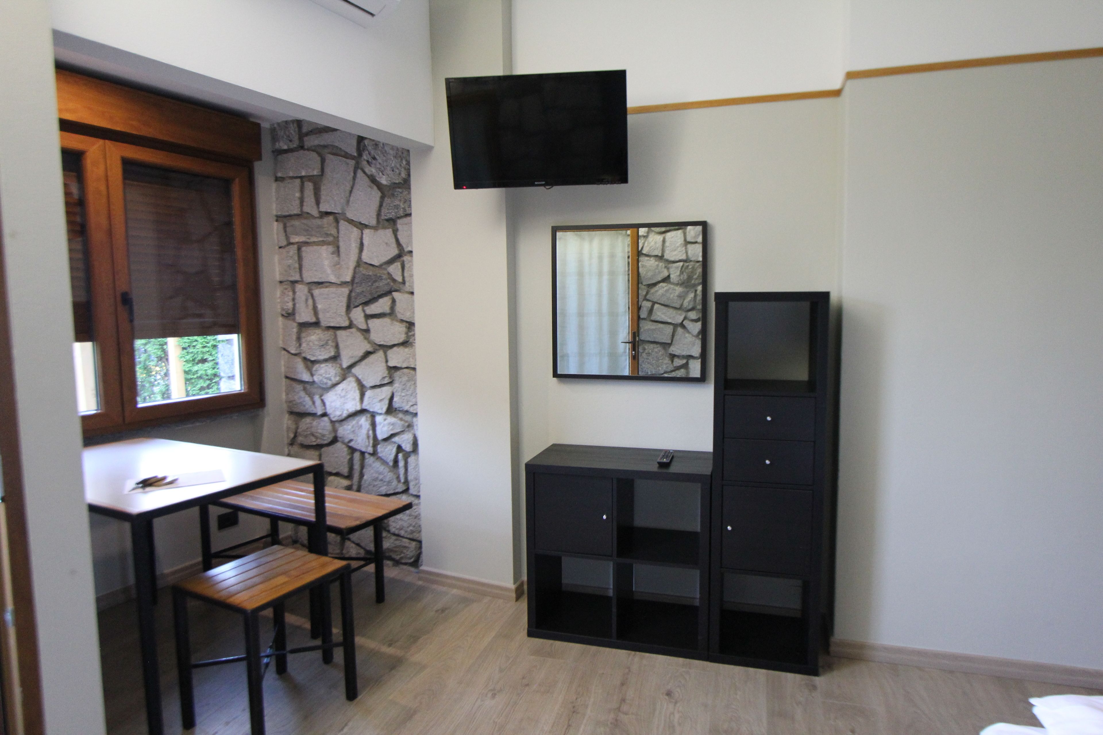 bungalow, 1 bedroom, patio, ground floor | living area | 32-inch flat-screen tv with satellite channels, tv, table football