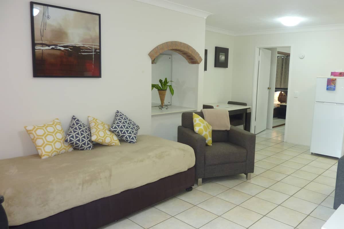 1 Bedroom Apartment | Living area | 0-inch TV with digital channels
