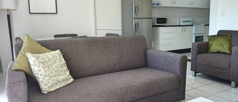 2 Bedroom Family Apartment | Living area | 0-inch TV with digital channels