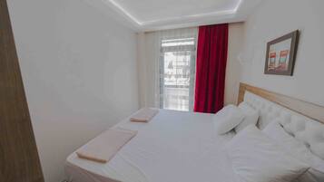 Family Suite | Egyptian cotton sheets, premium bedding, Select Comfort beds, desk