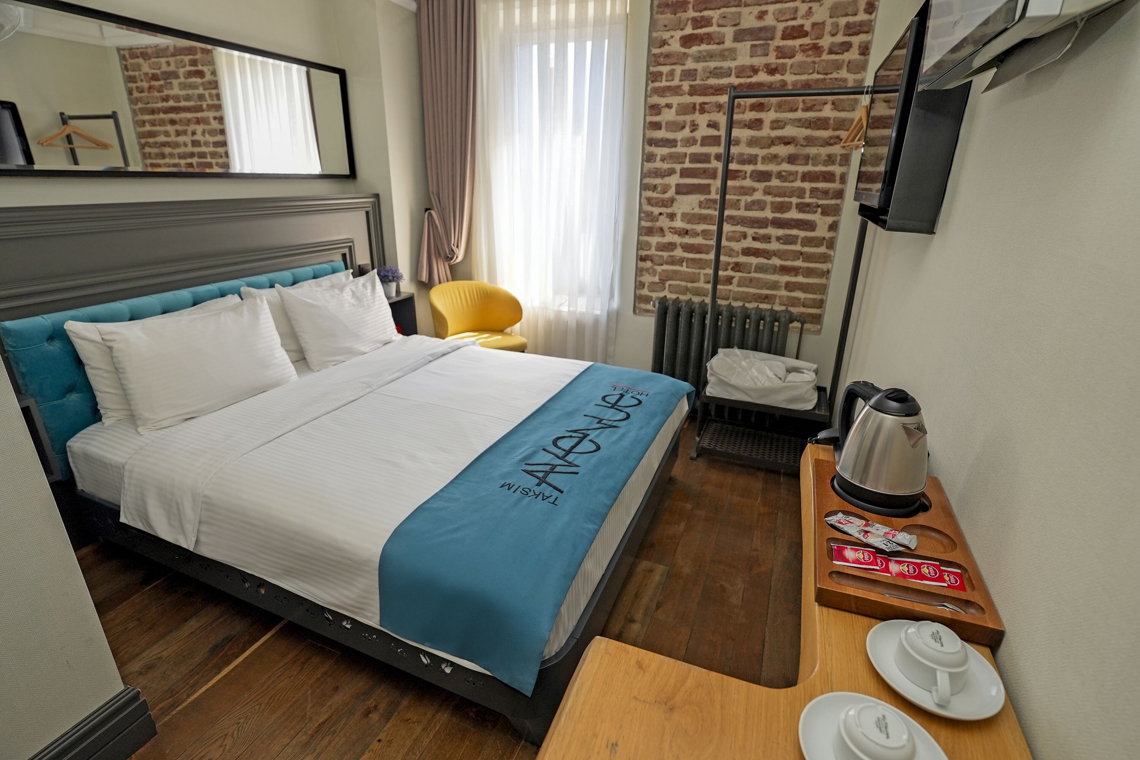 Premium bedding, down comforters, desk, laptop workspace