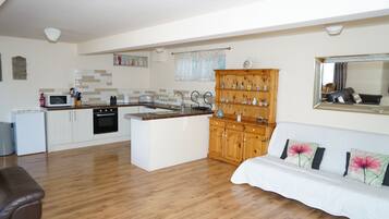 Family Studio, 1 Bedroom, Garden View, Ground Floor | Living area | Flat-screen TV, Netflix