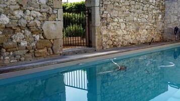 Outdoor pool, pool umbrellas, pool loungers