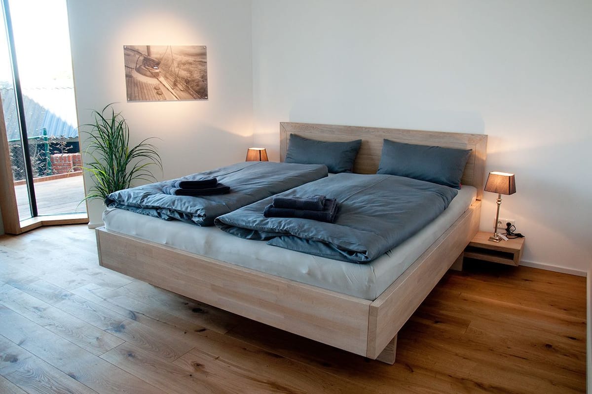 Deluxe Apartment, Fireplace, River View | 1 bedroom, in-room safe, soundproofing, iron/ironing board