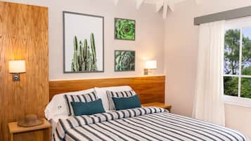 Ropa de cama de alta calidad y caja de seguridad en la habitación