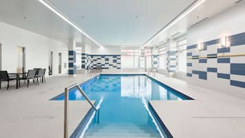 Indoor pool, open 7:00 AM to 10:00 PM, pool loungers