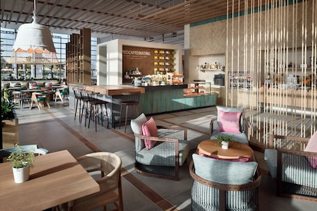 Breakfast, lunch, dinner served; international cuisine