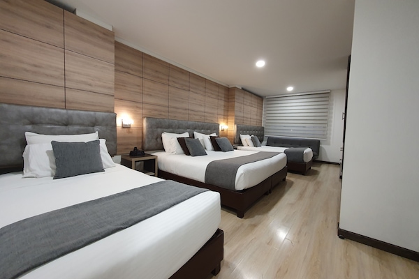 Deluxe Family Room | 1 bedroom, minibar, in-room safe, desk