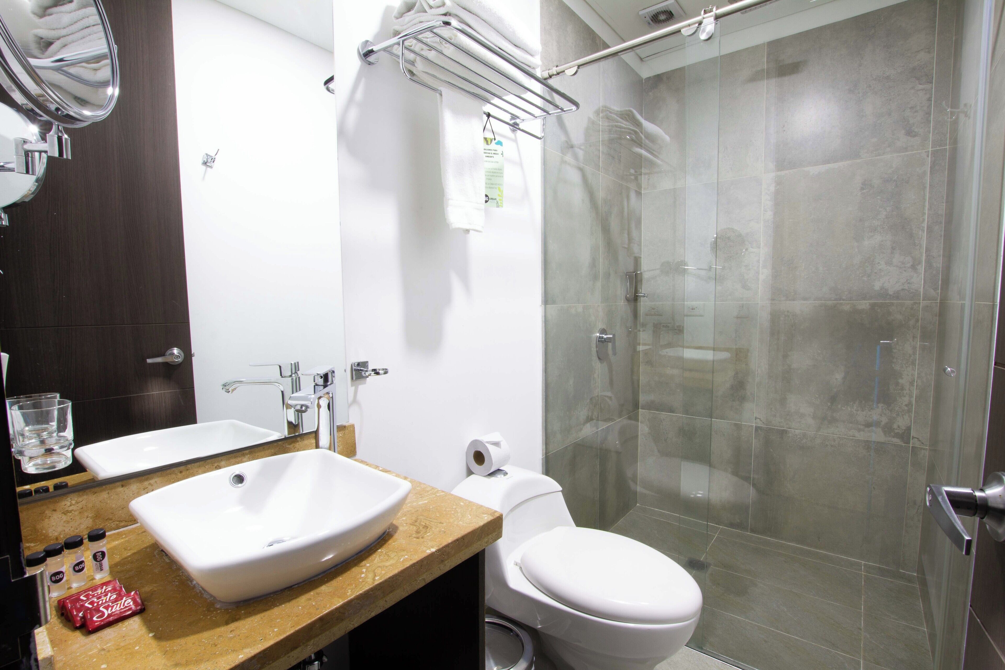 deluxe family room | bathroom | shower, free toiletries, hair dryer, towels