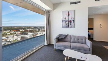 Two Bedroom Apartment with Large Balcony | Living area | Flat-screen TV