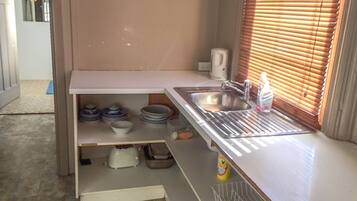 Appartement | Cuisine privée | CafetiÚre/bouilloire, bouilloire électrique